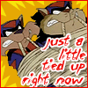 An icon of the SWAT Kats tied up with the text Just a little tied up right now